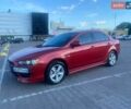 Красный Мицубиси Лансер, объемом двигателя 1.5 л и пробегом 280 тыс. км за 5500 $, фото 1 на Automoto.ua