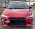 Червоний Міцубісі Lancer, об'ємом двигуна 1.8 л та пробігом 189 тис. км за 8990 $, фото 1 на Automoto.ua