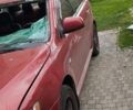 Красный Мицубиси Лансер, объемом двигателя 1.5 л и пробегом 240 тыс. км за 2500 $, фото 1 на Automoto.ua