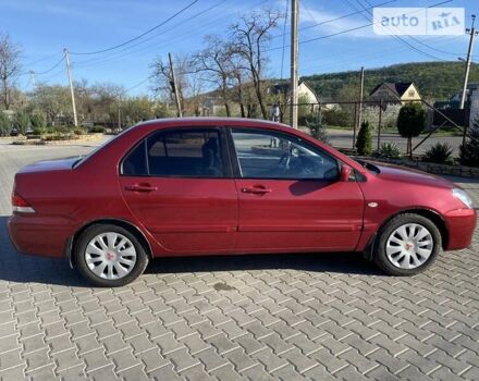 Червоний Міцубісі Lancer, об'ємом двигуна 0 л та пробігом 160 тис. км за 4244 $, фото 30 на Automoto.ua