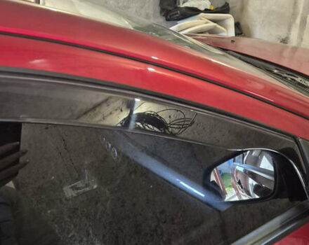 Красный Мицубиси Лансер, объемом двигателя 2 л и пробегом 65 тыс. км за 9300 $, фото 16 на Automoto.ua