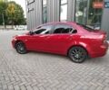 Красный Мицубиси Лансер, объемом двигателя 1.5 л и пробегом 210 тыс. км за 5799 $, фото 12 на Automoto.ua