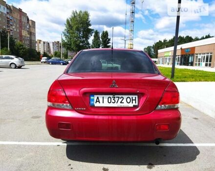 Червоний Міцубісі Lancer, об'ємом двигуна 1.6 л та пробігом 270 тис. км за 3999 $, фото 1 на Automoto.ua