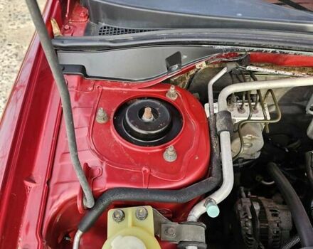 Червоний Міцубісі Lancer, об'ємом двигуна 1.6 л та пробігом 220 тис. км за 5800 $, фото 14 на Automoto.ua