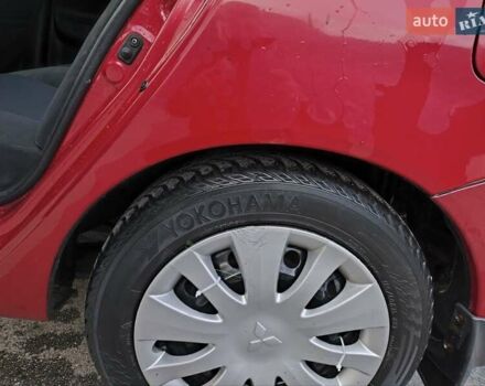 Червоний Міцубісі Lancer, об'ємом двигуна 1.58 л та пробігом 140 тис. км за 6000 $, фото 10 на Automoto.ua