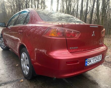 Червоний Міцубісі Lancer, об'ємом двигуна 0 л та пробігом 124 тис. км за 7555 $, фото 7 на Automoto.ua