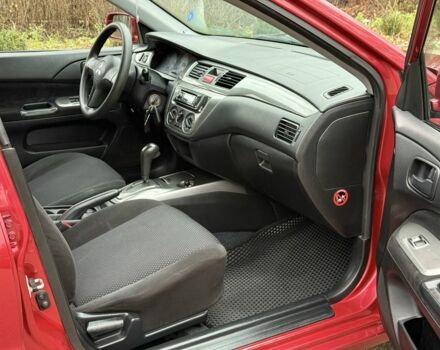 Червоний Міцубісі Lancer, об'ємом двигуна 1.6 л та пробігом 220 тис. км за 4600 $, фото 14 на Automoto.ua