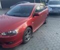 Червоний Міцубісі Lancer, об'ємом двигуна 2 л та пробігом 200 тис. км за 5350 $, фото 1 на Automoto.ua