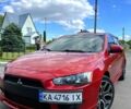 Червоний Міцубісі Lancer, об'ємом двигуна 2 л та пробігом 212 тис. км за 7400 $, фото 1 на Automoto.ua