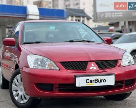 Червоний Міцубісі Lancer, об'ємом двигуна 1.58 л та пробігом 223 тис. км за 6400 $, фото 3 на Automoto.ua