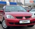 Червоний Міцубісі Lancer, об'ємом двигуна 1.58 л та пробігом 223 тис. км за 6400 $, фото 3 на Automoto.ua