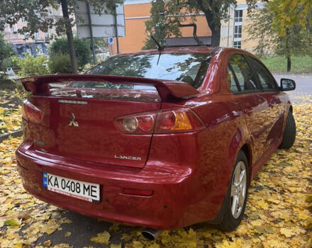 Червоний Міцубісі Lancer, об'ємом двигуна 2 л та пробігом 203 тис. км за 8000 $, фото 14 на Automoto.ua