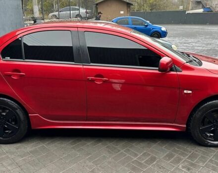 Червоний Міцубісі Lancer, об'ємом двигуна 2 л та пробігом 137 тис. км за 8500 $, фото 3 на Automoto.ua