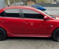 Червоний Міцубісі Lancer, об'ємом двигуна 2 л та пробігом 137 тис. км за 8500 $, фото 3 на Automoto.ua