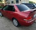 Червоний Міцубісі Lancer, об'ємом двигуна 1.6 л та пробігом 227 тис. км за 5300 $, фото 4 на Automoto.ua