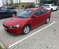 Красный Мицубиси Лансер, объемом двигателя 2 л и пробегом 227 тыс. км за 5300 $, фото 2 на Automoto.ua
