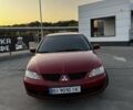 Червоний Міцубісі Lancer, об'ємом двигуна 1.6 л та пробігом 257 тис. км за 4600 $, фото 1 на Automoto.ua