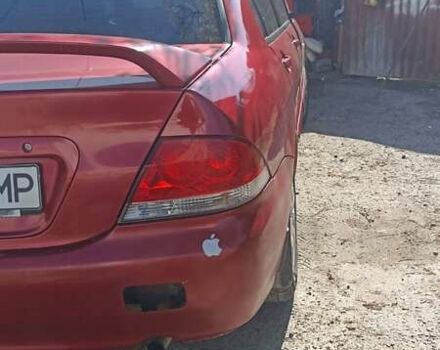 Мицубиси Лансер 2008 в Львове на Automoto.ua Красный Мицубиси Лансер, объемом двигателя 1.58 л и пробегом 280 тыс. км за 3200 $, фото 19 на Automoto.ua