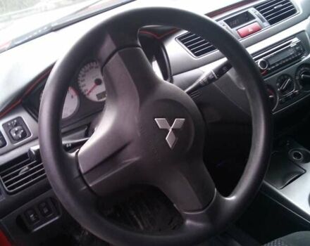 Червоний Міцубісі Lancer, об'ємом двигуна 1.6 л та пробігом 191 тис. км за 4900 $, фото 5 на Automoto.ua