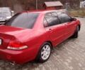 Червоний Міцубісі Lancer, об'ємом двигуна 1.6 л та пробігом 191 тис. км за 4900 $, фото 2 на Automoto.ua