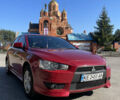 Красный Мицубиси Лансер, объемом двигателя 2 л и пробегом 201 тыс. км за 7200 $, фото 4 на Automoto.ua