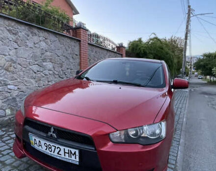 Міцубісі Lancer 2008 у Києві на Automoto.ua Червоний Міцубісі Lancer, об'ємом двигуна 2 л та пробігом 250 тис. км за 7000 $, фото 7 на Automoto.ua