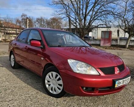 Червоний Міцубісі Lancer, об'ємом двигуна 1.6 л та пробігом 220 тис. км за 5800 $, фото 2 на Automoto.ua