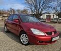 Червоний Міцубісі Lancer, об'ємом двигуна 1.6 л та пробігом 220 тис. км за 5800 $, фото 2 на Automoto.ua