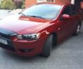 Червоний Міцубісі Lancer, об'ємом двигуна 2 л та пробігом 141 тис. км за 7600 $, фото 1 на Automoto.ua