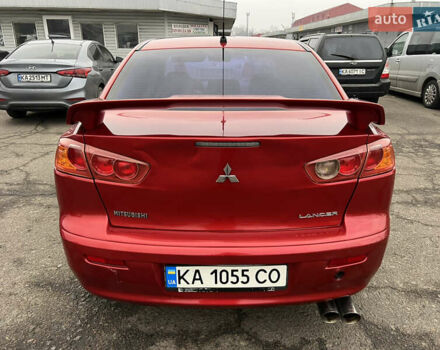 Красный Мицубиси Лансер, объемом двигателя 2 л и пробегом 330 тыс. км за 5250 $, фото 9 на Automoto.ua