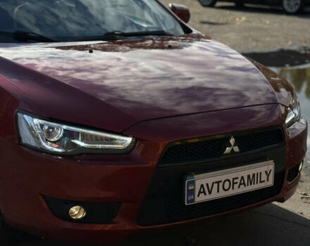 Червоний Міцубісі Lancer, об'ємом двигуна 2 л та пробігом 215 тис. км за 6500 $, фото 27 на Automoto.ua
