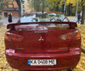Червоний Міцубісі Lancer, об'ємом двигуна 2 л та пробігом 203 тис. км за 8000 $, фото 12 на Automoto.ua