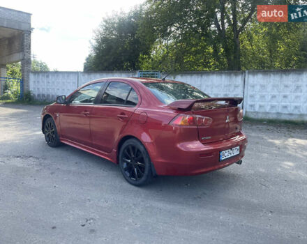 Червоний Міцубісі Lancer, об'ємом двигуна 2 л та пробігом 179 тис. км за 6499 $, фото 2 на Automoto.ua
