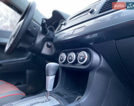 Красный Мицубиси Лансер, объемом двигателя 1.5 л и пробегом 120 тыс. км за 7699 $, фото 10 на Automoto.ua