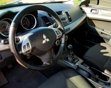 Красный Мицубиси Лансер, объемом двигателя 2 л и пробегом 110 тыс. км за 7500 $, фото 14 на Automoto.ua