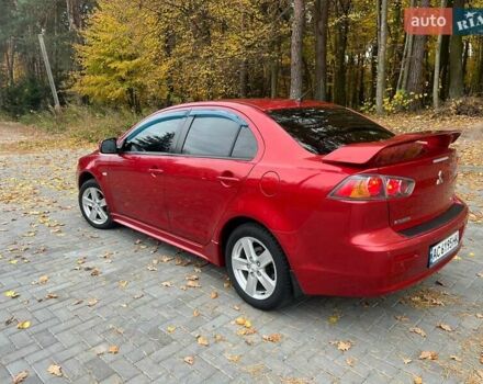 Красный Мицубиси Лансер, объемом двигателя 2 л и пробегом 197 тыс. км за 6500 $, фото 17 на Automoto.ua