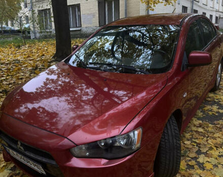 Червоний Міцубісі Lancer, об'ємом двигуна 2 л та пробігом 203 тис. км за 8000 $, фото 3 на Automoto.ua