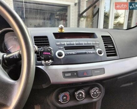 Міцубісі Lancer 2008 у Житомирі на Automoto.ua Червоний Міцубісі Lancer, об'ємом двигуна 1.5 л та пробігом 155 тис. км за 6200 $, фото 11 на Automoto.ua