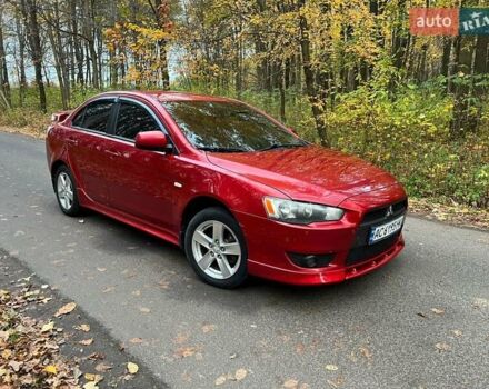 Красный Мицубиси Лансер, объемом двигателя 2 л и пробегом 197 тыс. км за 6500 $, фото 9 на Automoto.ua