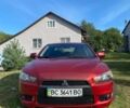 Червоний Міцубісі Lancer, об'ємом двигуна 2 л та пробігом 94 тис. км за 7000 $, фото 1 на Automoto.ua