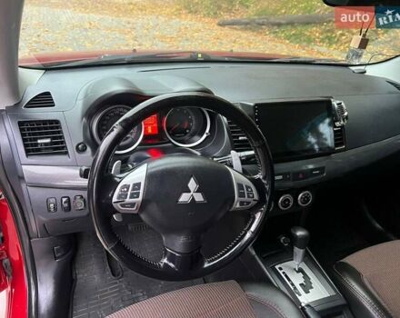 Красный Мицубиси Лансер, объемом двигателя 2 л и пробегом 197 тыс. км за 6500 $, фото 15 на Automoto.ua