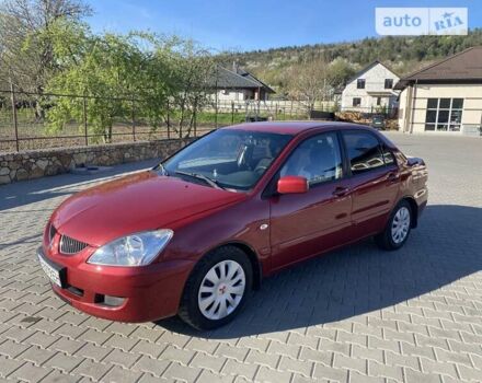 Червоний Міцубісі Lancer, об'ємом двигуна 0 л та пробігом 160 тис. км за 4244 $, фото 39 на Automoto.ua