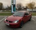 Червоний Міцубісі Lancer, об'ємом двигуна 1.6 л та пробігом 385 тис. км за 4500 $, фото 1 на Automoto.ua