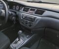 Червоний Міцубісі Lancer, об'ємом двигуна 1.6 л та пробігом 140 тис. км за 6000 $, фото 14 на Automoto.ua