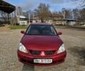 Червоний Міцубісі Lancer, об'ємом двигуна 1.6 л та пробігом 220 тис. км за 5800 $, фото 1 на Automoto.ua