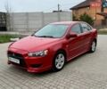 Червоний Міцубісі Lancer, об'ємом двигуна 2 л та пробігом 222 тис. км за 6100 $, фото 1 на Automoto.ua