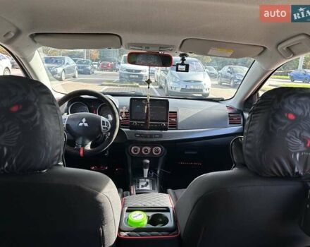 Красный Мицубиси Лансер, объемом двигателя 2 л и пробегом 227 тыс. км за 7000 $, фото 15 на Automoto.ua