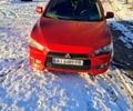 Красный Мицубиси Лансер, объемом двигателя 2 л и пробегом 200 тыс. км за 5500 $, фото 1 на Automoto.ua