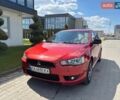 Красный Мицубиси Лансер, объемом двигателя 1.5 л и пробегом 216 тыс. км за 5500 $, фото 1 на Automoto.ua