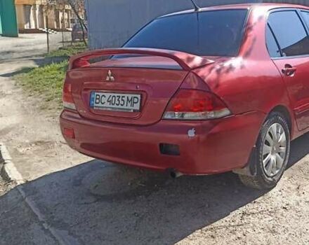 Мицубиси Лансер 2008 в Львове на Automoto.ua Красный Мицубиси Лансер, объемом двигателя 1.58 л и пробегом 280 тыс. км за 3200 $, фото 24 на Automoto.ua